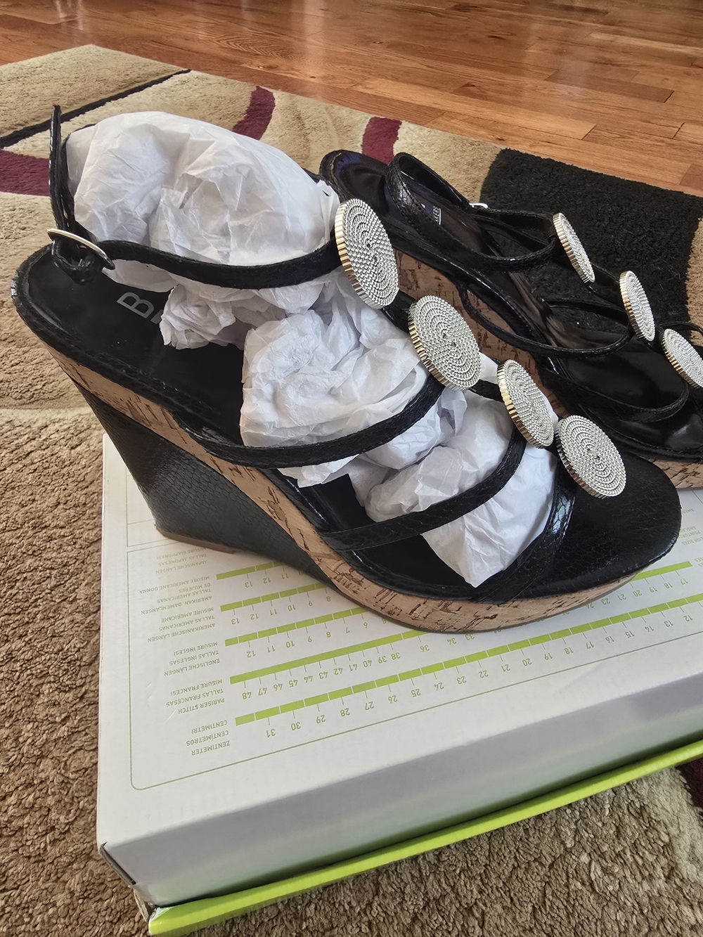 BAKERS Black Women's Cork Wedge Sandals with Decorative Medallions